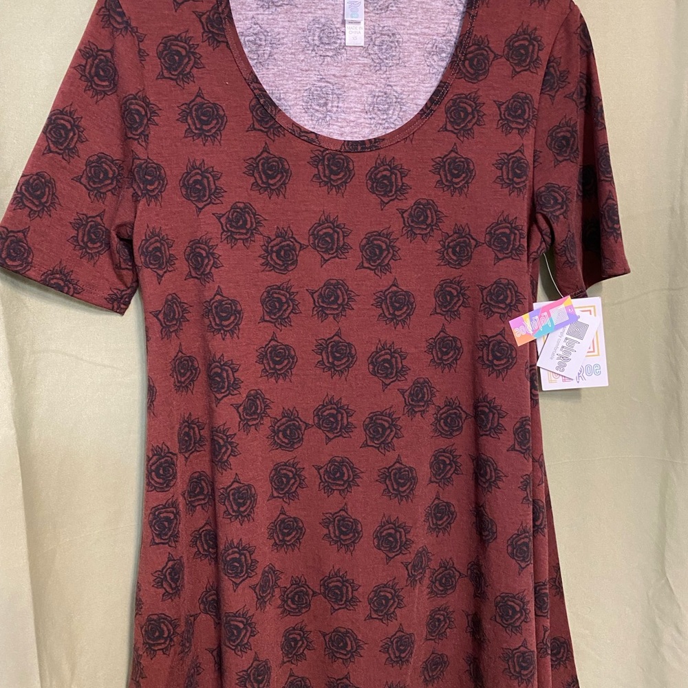 Lula Roe new with tags Top. Called to as perfect tee on the tag…Nice